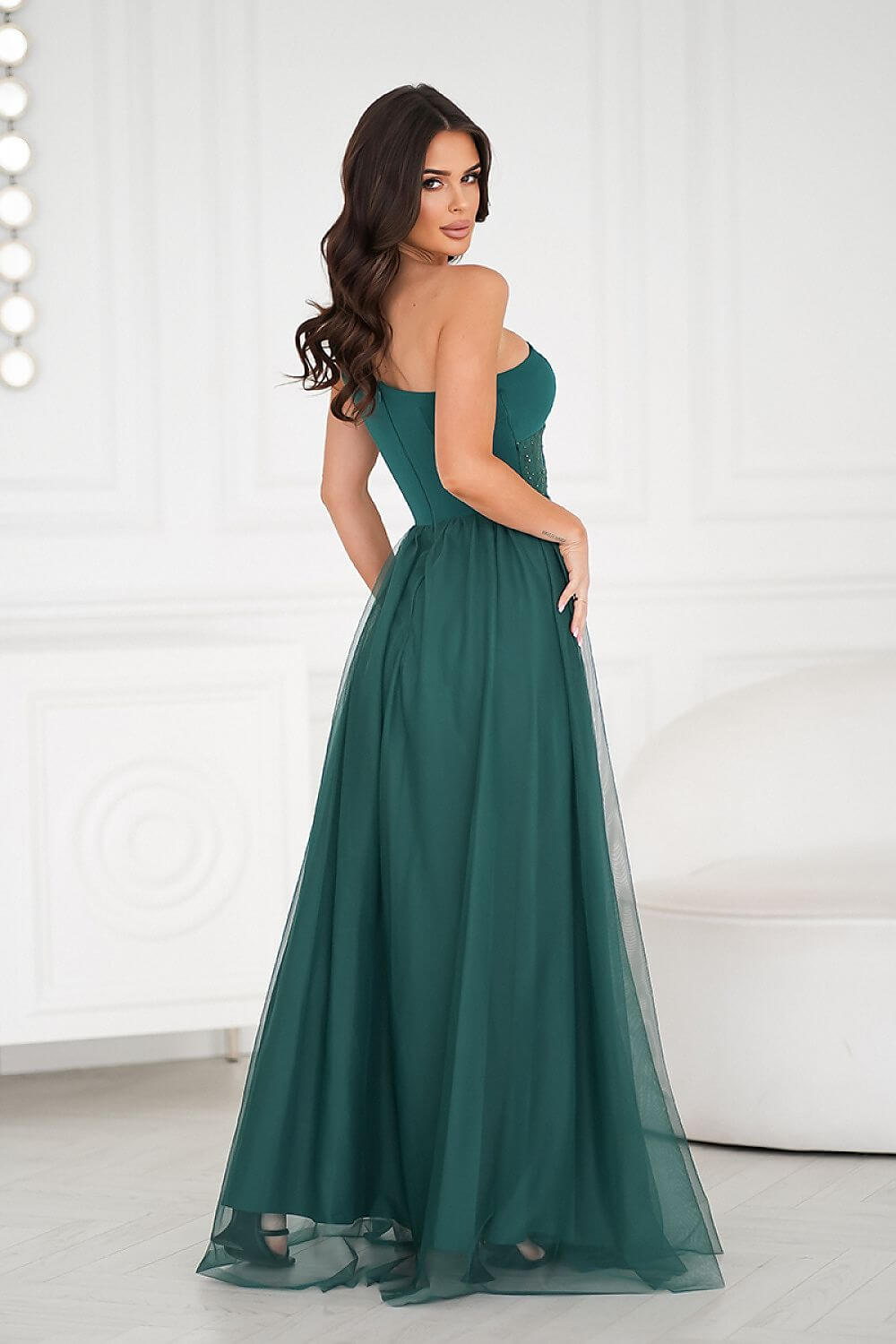 Alayna Full-length Emerald Green A-line Bridesmaid, Prom, or Evening Gown with Asymmetric Sequined Corset Top and Tulle Skirt- back view by Orange Blossom Bridal