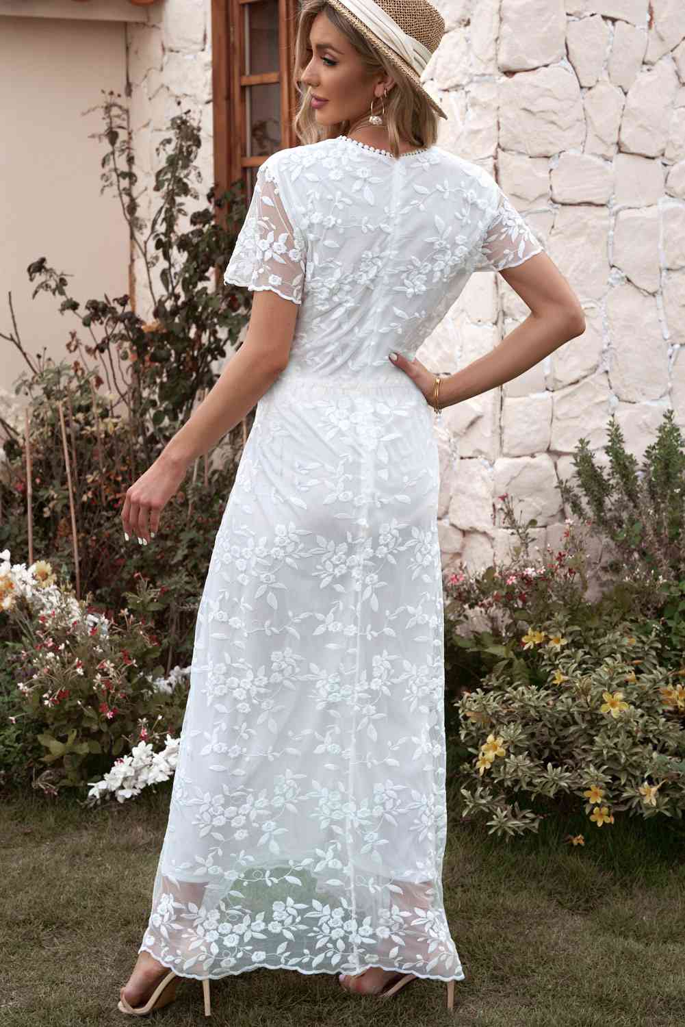 Ambrosia White Embroidered Floral Lace Crochet Detail Modest A-line Wedding Dress with Flutter Sleeves- back view by Orange Blossom Bridal