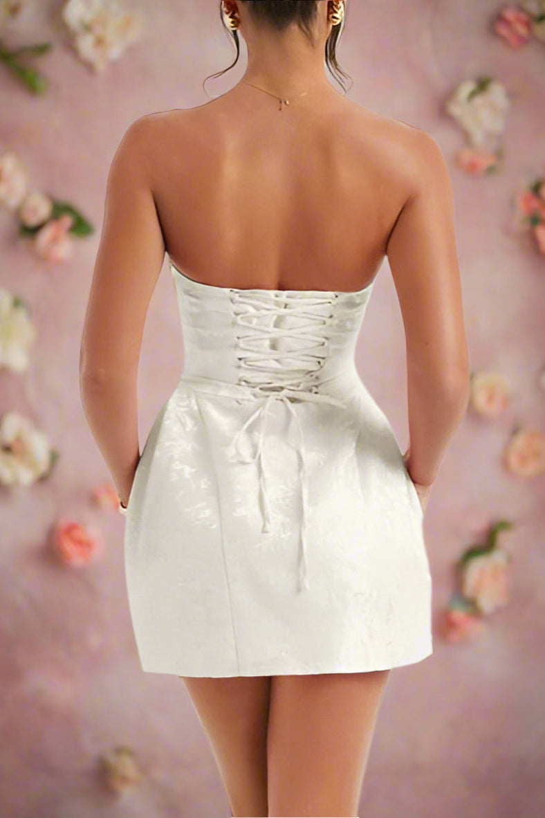 Amora White Strapless Structured Corseted Lace-up Hourglass Convertible Mini Wedding Dress with Satin Jacquard Fabric- back view by Orange Blossom Bridal
