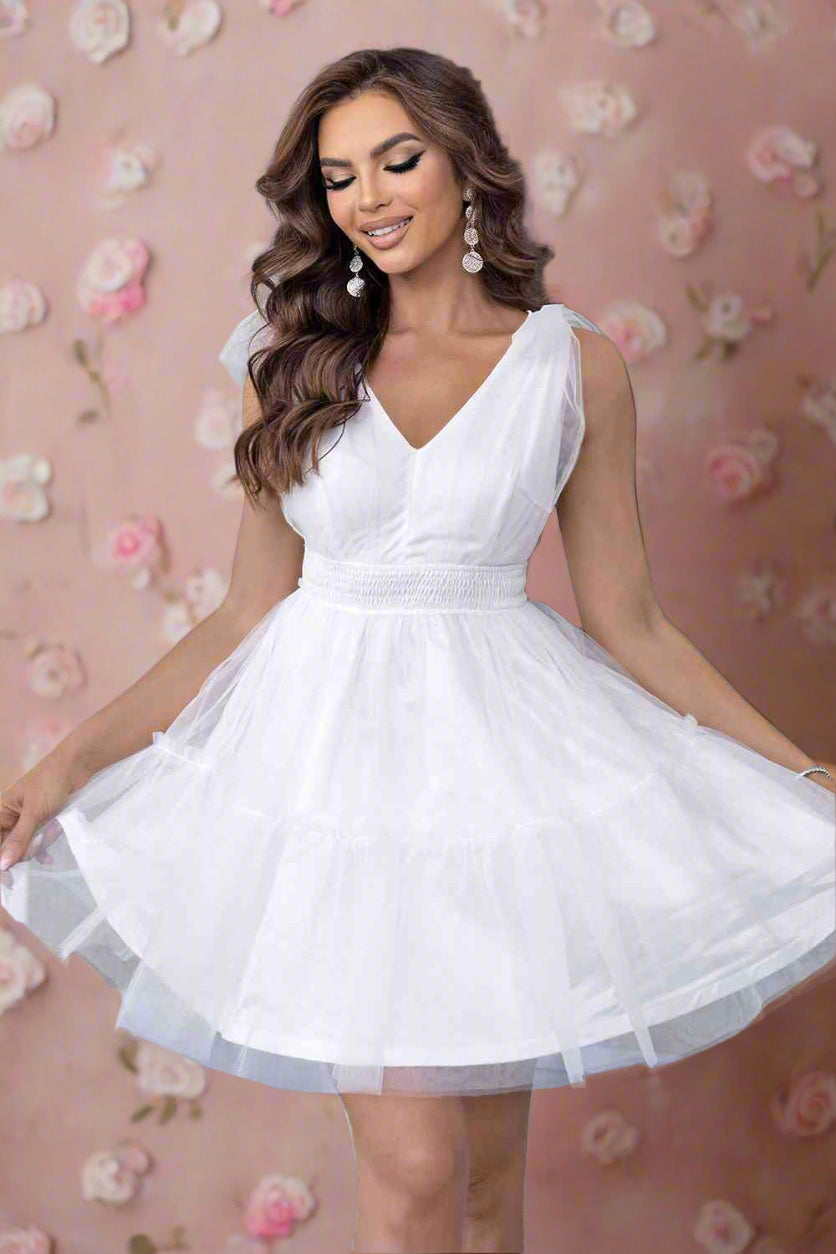 Arielle White Tulle Mini Babydoll Wedding Dress with Full Ballerina Skirt, V-Neckline, and Bow Details on the Shoulder Straps - Orange Blossom Bridal